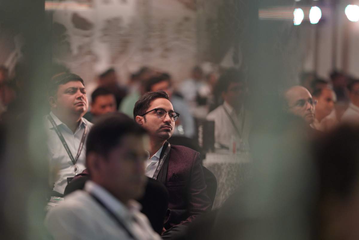 Delegates in the audience watching the stage at Pharmig India 2025